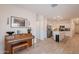 The living room has neutral paint, recessed lighting, and tile flooring. Kitchen adjacent at 948 E Wiley Way, Casa Grande, AZ 85122