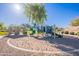 Community playground featuring slides, climbing areas, and a shade structure at 948 E Wiley Way, Casa Grande, AZ 85122