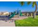 Community playground with shade structure, slides and climbing areas at 948 E Wiley Way, Casa Grande, AZ 85122