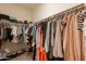 Organized walk-in closet featuring ample hanging space and shelving for shoes and accessories at 948 E Wiley Way, Casa Grande, AZ 85122
