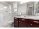 Bathroom featuring a modern vanity, spacious shower, and neutral tones at 1036 W Siebold Tree Ave, Queen Creek, AZ 85140