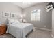 Bedroom featuring neutral tones, carpet, and a window with blinds at 1036 W Siebold Tree Ave, Queen Creek, AZ 85140