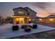 Extensive backyard with a cozy patio and seating area that is perfect for entertaining at 11737 N 143Rd Dr, Surprise, AZ 85379