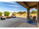 Spacious outdoor living space, with a fire pit and seating. There is also an outdoor dining set at 11737 N 143Rd Dr, Surprise, AZ 85379