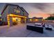 Expansive backyard featuring a spacious patio area, perfect for outdoor gatherings and evening entertainment at 11737 N 143Rd Dr, Surprise, AZ 85379