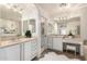 Bright bathroom with dual sinks, vanity area, and large mirrors offering ample space at 11737 N 143Rd Dr, Surprise, AZ 85379