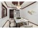 Chic dining room with modern table setting and stylish overhead lighting at 11737 N 143Rd Dr, Surprise, AZ 85379