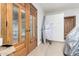 Elegant front entryway featuring a glass-paneled double door, leading to a bright interior at 11737 N 143Rd Dr, Surprise, AZ 85379