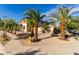 Charming two-story home with desert rock landscape and sidewalk at 11737 N 143Rd Dr, Surprise, AZ 85379