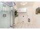 Bright laundry area featuring a utility shower and ample cabinet space at 11737 N 143Rd Dr, Surprise, AZ 85379