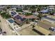Aerial view of a home with solar panels, a pool, and an enclosed backyard, offering privacy at 1191 E Avenida Fresca St, Casa Grande, AZ 85122