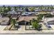 Charming suburban home with a well-manicured lawn, mature trees, and a private driveway at 1191 E Avenida Fresca St, Casa Grande, AZ 85122