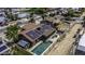 Aerial view of a home with solar panels, backyard pool, and covered patio, ideal for outdoor living at 1191 E Avenida Fresca St, Casa Grande, AZ 85122