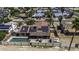 Aerial view of a house with solar panels, a pool, and a grill in a fenced backyard at 1191 E Avenida Fresca St, Casa Grande, AZ 85122