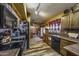 Kitchen with wooden cabinets, tile countertops, and appliances at 1191 E Avenida Fresca St, Casa Grande, AZ 85122