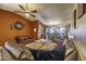 Open concept living room features wood floors and flows into the dining room and kitchen at 1191 E Avenida Fresca St, Casa Grande, AZ 85122