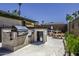 Spacious backyard with a built-in outdoor kitchen and a barbecue grill, perfect for entertaining at 1191 E Avenida Fresca St, Casa Grande, AZ 85122