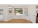 Bright breakfast nook with a bay window overlooking the pool and backyard at 12217 W Edgemont Ave, Avondale, AZ 85392
