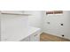 Laundry room with white cabinets, white countertops, and utility hookups at 12217 W Edgemont Ave, Avondale, AZ 85392
