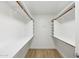 Well-organized walk-in closet offers ample shelving and storage space for clothes and accessories at 12217 W Edgemont Ave, Avondale, AZ 85392