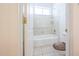 Bathroom features a tub and tiled floor at 12721 W Georgia Ave, Litchfield Park, AZ 85340