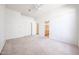 Bright bedroom with closet and ensuite bathroom access at 12721 W Georgia Ave, Litchfield Park, AZ 85340