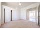 Bright bedroom with double door closet and ceiling fan provides a comfortable retreat at 12721 W Georgia Ave, Litchfield Park, AZ 85340