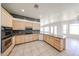 Kitchen boasts light wood cabinetry, stainless steel appliances, and granite countertops at 12721 W Georgia Ave, Litchfield Park, AZ 85340