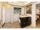 Convenient laundry room with washer, dryer, and storage solutions for organized efficiency at 13807 N Garden Court Dr, Sun City, AZ 85351