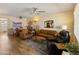 Inviting living room showcasing comfortable seating, modern decor, and bright, natural light at 13807 N Garden Court Dr, Sun City, AZ 85351