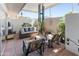 Charming outdoor patio with comfortable seating, lush plants, and a serene ambiance at 13807 N Garden Court Dr, Sun City, AZ 85351