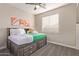 Comfortable bedroom featuring a cozy trundle bed and neutral walls at 139 E Gail Dr, Gilbert, AZ 85296