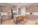 Kitchen featuring stainless steel appliances, a center island, and a coffee bar area at 139 E Gail Dr, Gilbert, AZ 85296