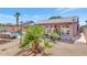 This backyard offers a tranquil retreat with its sparkling pool, covered patio and lush landscaping at 15740 N 91St Dr, Peoria, AZ 85382