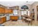 Bright kitchen with an eat-in area and view of the backyard at 15740 N 91St Dr, Peoria, AZ 85382