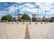 Entrance of a community baseball field with baseball decor and stadium lighting at 16186 W Port Royale Ln, Surprise, AZ 85379