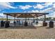 Lakeside gazebo offers residents a shaded area to gather and enjoy the water views at 16186 W Port Royale Ln, Surprise, AZ 85379