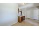 View into the kitchen with wine rack and entrance to other rooms in the home at 16186 W Port Royale Ln, Surprise, AZ 85379