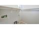 A laundry room with available utilities and open shelving at 16186 W Port Royale Ln, Surprise, AZ 85379
