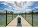 Well-maintained tennis courts offer residents the perfect place to enjoy a game of tennis on a sunny day at 16186 W Port Royale Ln, Surprise, AZ 85379