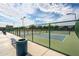 Well-maintained tennis courts provide residents with a place to enjoy an afternoon game at 16186 W Port Royale Ln, Surprise, AZ 85379