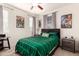 Comfortable bedroom featuring neutral walls, ceiling fan, and ample natural light at 17717 W Mandalay Ln, Surprise, AZ 85388