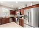 This spacious kitchen boasts stainless steel appliances, granite countertops, and ample cabinet space at 17717 W Mandalay Ln, Surprise, AZ 85388