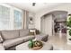 Inviting living room featuring a comfortable sectional sofa and stylish decor at 17717 W Mandalay Ln, Surprise, AZ 85388