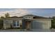 Beautiful single story home with a two car garage and desert landscaping at 17831 W Pasadena Ave, Litchfield Park, AZ 85340