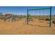 Playground featuring swings and climbing equipment for families and children at 17831 W Pasadena Ave, Litchfield Park, AZ 85340