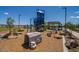 Community playground with climbing structures, slides, and a shaded picnic area for residents at 17836 W Pasadena Ave, Litchfield Park, AZ 85340