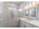 Luxurious bathroom with marble countertops, modern fixtures, and a sleek glass shower enclosure at 1904 E Grand Canyon Dr, Chandler, AZ 85249