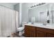 Bathroom featuring a double sink vanity, toilet, and a shower/tub combination with modern fixtures at 1904 E Grand Canyon Dr, Chandler, AZ 85249
