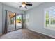 Bedroom with sliding doors to a patio and pool area at 1904 E Grand Canyon Dr, Chandler, AZ 85249